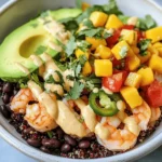 In the world of culinary delights, few dishes are as vibrant and tantalizing as Shrimp & Avocado Bowls topped with Zesty Mango Salsa and a zesty Lime-Chili Drizzle. This recipe combines succulent shrimp, creamy avocado, and refreshing mango salsa, creating a symphony of flavors that is both satisfying and nutritious. Perfect for a light lunch or a hearty dinner, these bowls are not only visually appealing but also packed with essential nutrients. Join us as we explore the step-by-step preparation of this delightful dish, its health benefits, and some interesting facts about its ingredients.