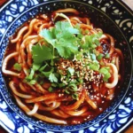 In the bustling world of quick meals, Spicy 10-Minute Chili Oil Udon Noodles stand out as a delicious and satisfying option. This dish combines the heartiness of udon noodles with a burst of flavor from a rich, spicy sauce, making it a perfect choice for lunch or dinner. With just a handful of ingredients and minimal cooking time, this recipe is not only easy to follow but also incredibly versatile. Whether you're a busy professional seeking a quick meal or a culinary enthusiast looking to whip up something special, these udon noodles will surely impress.